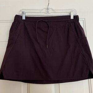 Women’s Te Verde dark purple active tennis pickleball skirt with pockets.Medium